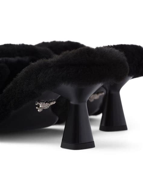 prada ear muffs|Black Shearling Mules .